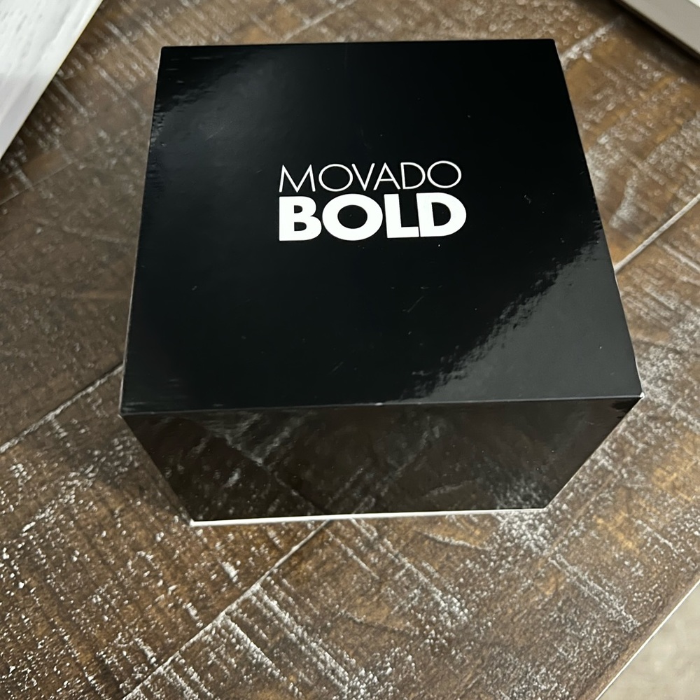 Rose gold Movado watch.